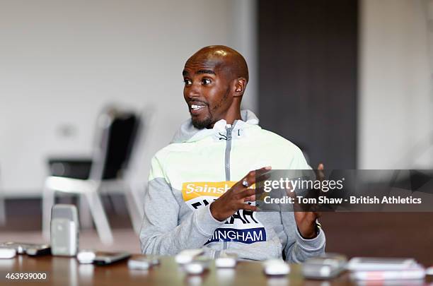 Mo Farah of Great Britain talks to the press during the preview press conference for the Sainsbury's Indoor Grand Prix at the Crowne Plaza Hotel on...