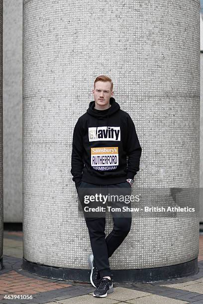 Greg Rutherford of Great Britain tposes for a picture during the press during the preview press conference for the Sainsbury's Indoor Grand Prix at...