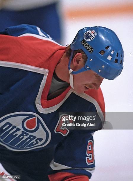 Wayne Gretzky of the Edmonton Oilers prepares for the face-off against Toronto Maple Leafs during NHL game action at Maple Leaf Gardens in Toronto,...