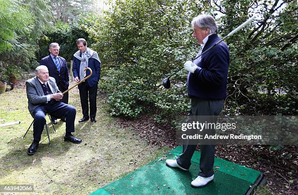 John Jacobs of England gives Michael King of England a lesson as Ken Schofield and George O'Grady look on at Jacobs' home on April 18, 2013 in...