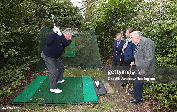 John Jacobs of England gives Michael King of England a lesson as Ken Schofield and George O'Grady look on at Jacobs' home on April 18, 2013 in...