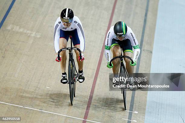 Jessica Varnish of the Great Britain Cycling Team sticks out her tounge as she crosses the finish line and beats Anna Mears of Australia in the...