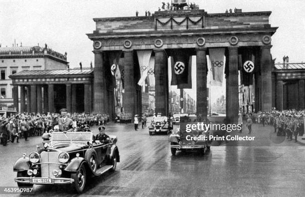 Adolf Hitler, Brandenburg Gate, Games of the XI Olympiad, Berlin, 1936. Adolf Hitler opening the 11th Olympic Games in Berlin on 1 August 1936. A...