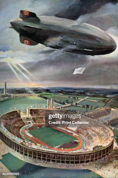 'Hindenburg' zeppelin above the Olympic Stadium, Berlin, 1936. The airship, destroyed in a disastrous fire whilst landing in New Jersey the following...