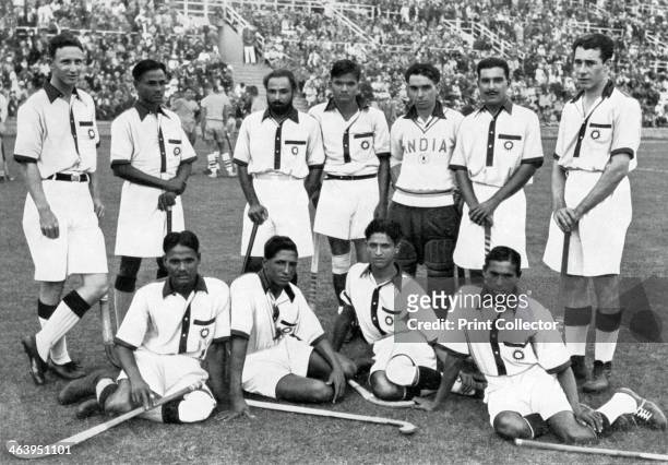 The Indian hockey team, gold medal winners, Berlin Olympics, 1936. A print from Olympia 1936, Die Olympischen Spiele 1936, Volume II,...