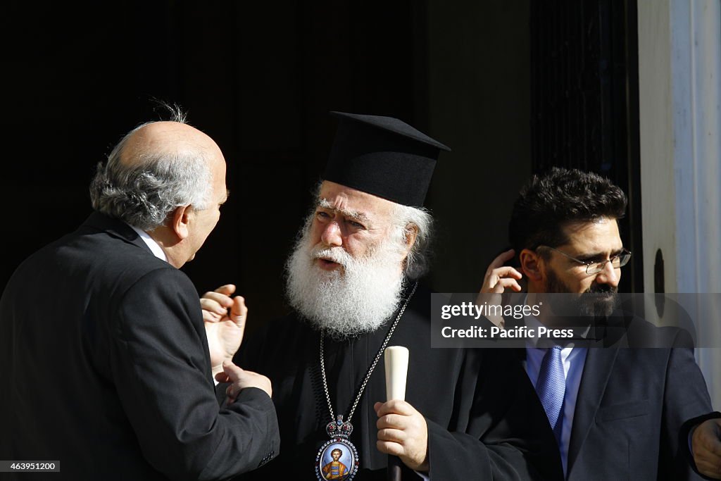 Patriarch Theodore II of Alexandria (center) leaves the...