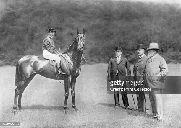 Minoru , 1909 . Minoru pictured with jockey Herbert Jones on board. Also present are the horse's owner, King Edward VII, Lord Marcus Beresford, who...