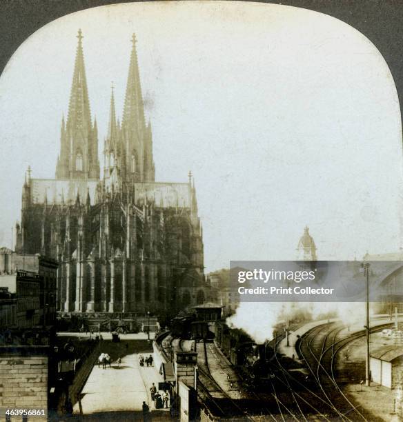 Cologne Cathedral from a railway bridge, Cologne, Germany. The cathedral in Cologne was begun in 1248 but was not finally completed until 1880. It is...