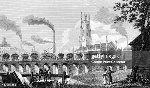 Christ Church and Coal Staith, Leeds, West Yorkshire, 1829. An early steam locomotive hauls a train of coal wagons across a bridge, observed by...