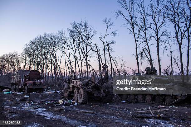 Destroyed military equipment litters the road on February 20, 2015 in Debaltseve, Ukraine. Ukrainian forces withdrew from the strategic and...