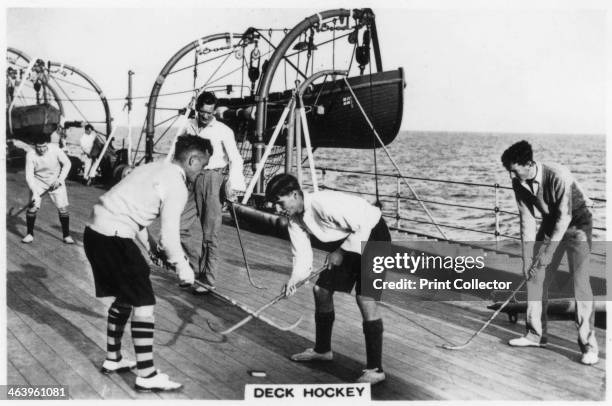 Deck hockey on board the battleship HMS 'Nelson', 1937. Cigarette card from The Navy series, produced by Senior Service Cigarettes, 1937.