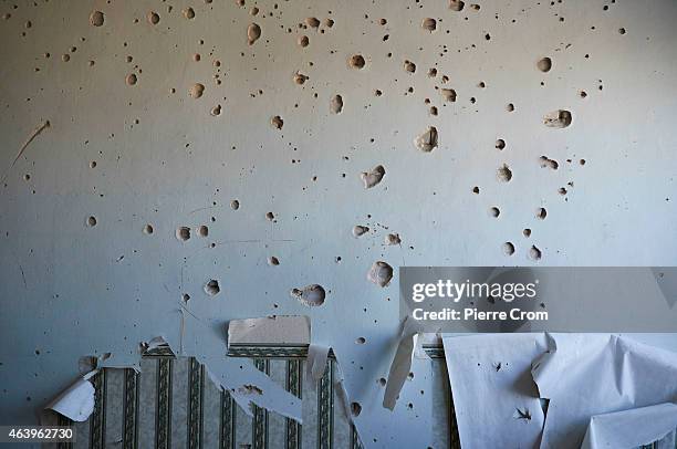 House that was hit by a shell during fighting for the town is seen on February 20, 2015 in Debaltseve, Ukraine. The strategic railway town of...