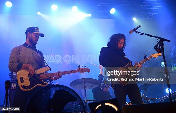 David Hartley, Charlie Hall and Adam Granduciel of The War on Drugs perform on stage at the 02 Academy for the BBC 6 Music Festival 2015 on February...