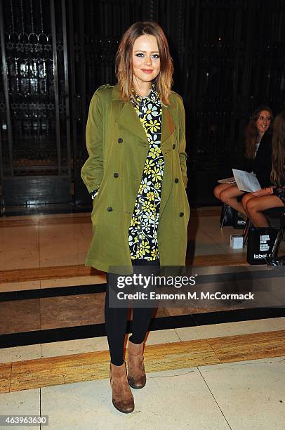 Emily Atack attends the Ashley Isham show during London Fashion Week Fall/Winter 2015/16 at on February 20, 2015 in London, England.