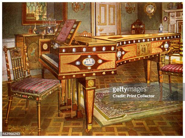 Late 18th century decorative furniture, 1911-1912. Satinwood and mahogany inlaid pianoforte with Wedgewood plaques, ormolu mounts, panel and stars,...