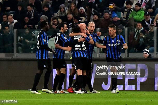 Atalanta's midfielder Giulio Migliaccio celebrates after scoring a goal on February 20, 2015 during a Serie A football match Juventus vs Atalanta at...