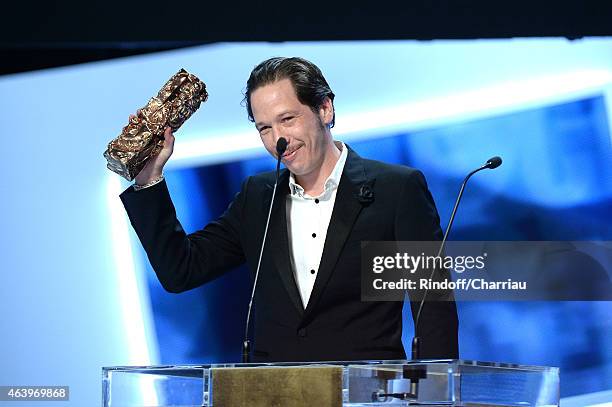 Actor Reda Kateb receives the award for Best Actor in a Supporting Role in 'Hippocrate' during the 40th Cesar Film Awards 2015 Ceremony at Theatre du...