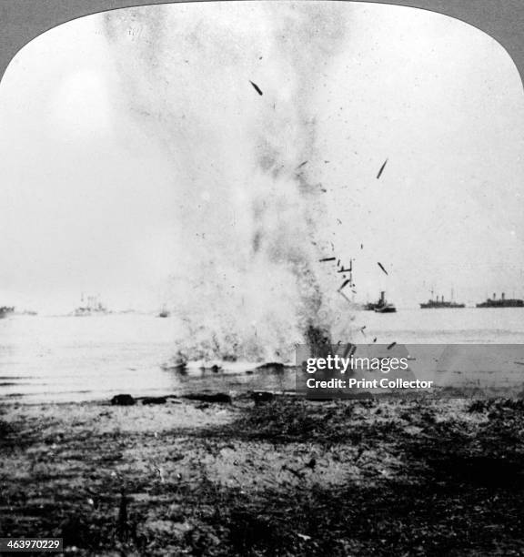 Trapped German submarine driven inshore and destroyed, World War I, 1914-1918. Stereoscopic card detail.