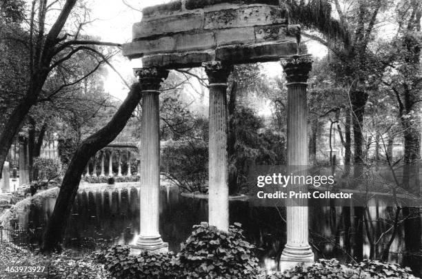 The Naumachia's Corinthian columns, Parc Monceau, Paris, 1931. The Naumachia water feature is surrounded by Classical columns. Illustration from the...