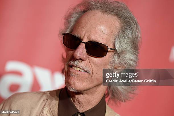 Musician John Densmore of the Doors arrives at the 2015 MusiCares Person of The Year honoring Bob Dylan at Los Angeles Convention Center on February...