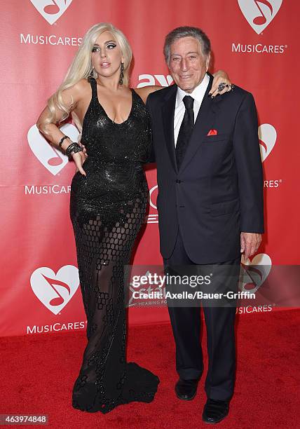 Recording artists Lady Gaga and Tony Bennett arrive at the 2015 MusiCares Person of The Year honoring Bob Dylan at Los Angeles Convention Center on...