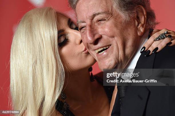 Recording artists Lady Gaga and Tony Bennett arrive at the 2015 MusiCares Person of The Year honoring Bob Dylan at Los Angeles Convention Center on...