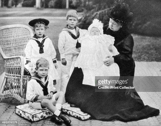 Queen Victoria with her great-granchildren at Osborne House, Isle of Wight, 1900. The Queen with Princes Edward, Albert, Henry and Princess Mary. A...