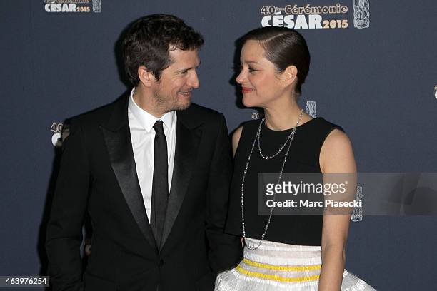 Guillaume Canet and Marion Cotillard attend the 'CESARS' Film awards at Theatre du Chatelet on February 20, 2015 in Paris, France.