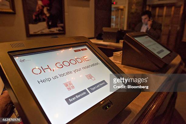 Check-in kiosks await guests in the lobby of the Virgin Hotels Chicago in Chicago, Illinois, U.S., on Friday, Feb. 20, 2015. The 250-room hotel in...