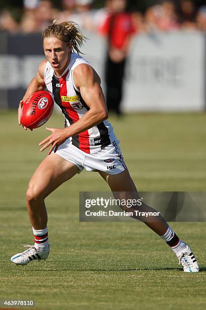 Eli Templeton of the Saints runs with the ball during the St Kilda Saints AFL intra club match at Linen House Oval on February 21, 2015 in Melbourne,...