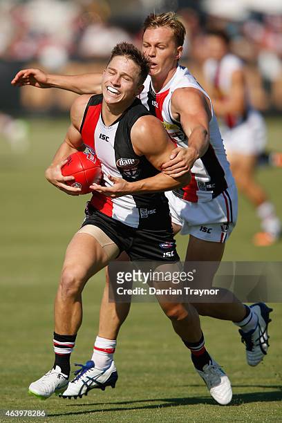 Jack Billings is tackled by Daniel Markworth of the Saints during the St Kilda Saints AFL intra club match at Linen House Oval on February 21, 2015...