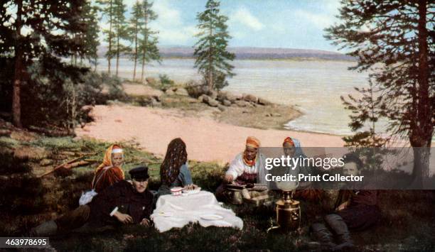 Karelians having tea by a river, near Archangel, Russia, c1930s. A print from Countries of the World, edited by JA Hammerton, volume V, the Fleetway...