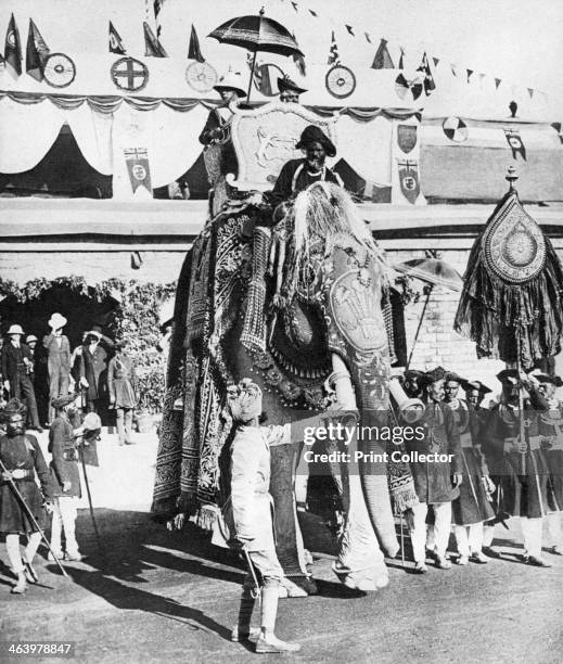 The Prince of Wales with the Maharajah of Gwalior during his Indian tour, 1921. The future King Edward VIII and his host ride in the howdah of a...