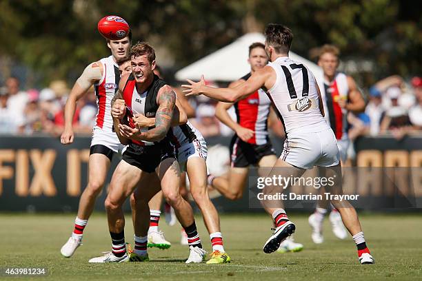 Tim Membrey handballs during the St Kilda Saints AFL intra club match at Linen House Oval on February 21, 2015 in Melbourne, Australia.