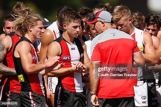 Senior coach Alan Richardson speaks with his players during the St Kilda Saints AFL intra club match at Linen House Oval on February 21, 2015 in...