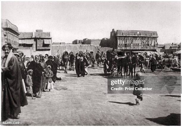 The bazaar square in Basra, Iraq, 1925. A print from Baghdad, Camera Studio Iraq, published by Hasso Bros, Rotophot AG, Berlin, 1925.