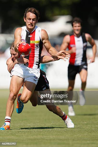 Jimmy Webster tackles Josh Saunders during the St Kilda Saints AFL intra club match at Linen House Oval on February 21, 2015 in Melbourne, Australia.