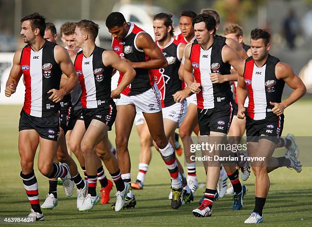 St Kilda Kilda players warm up before the St Kilda Saints AFL intra club match at Linen House Oval on February 21, 2015 in Melbourne, Australia.