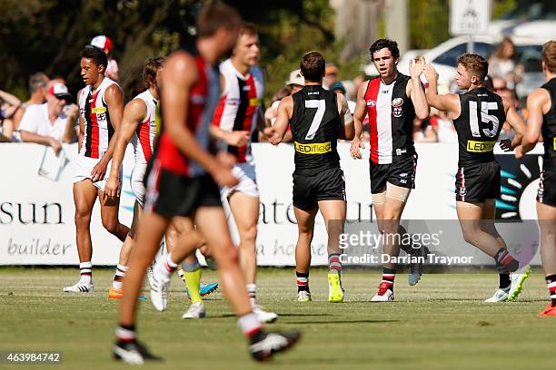 Paddy McCartin is congratulated by team mates after kicking a goal during the St Kilda Saints AFL intra club match at Linen House Oval on February...