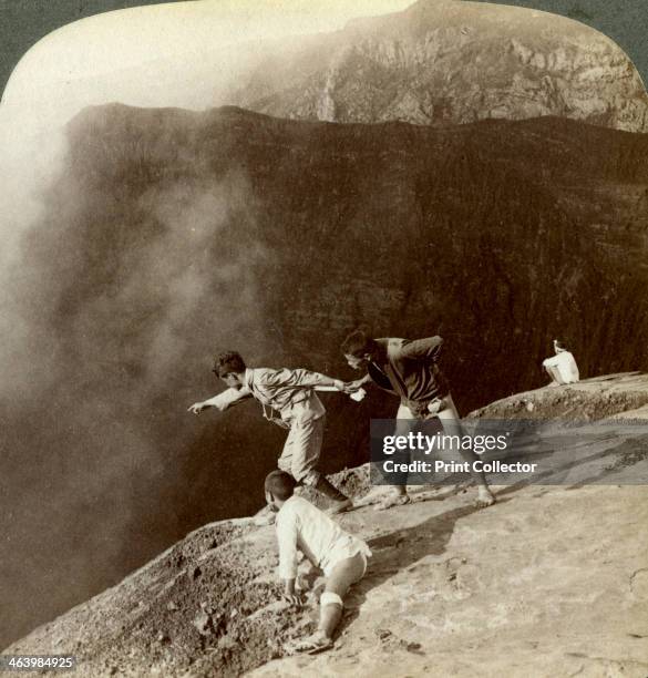 Lookingng through sulphurous vapors into the crater's depths, Aso-san, Japan, 1904. Mount Aso , on the island of Kyushu, is the largest active...