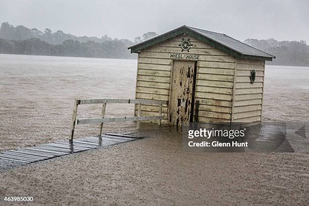 The Maroochydore River rises at high tide and threatens homes in Maroochydore, after a deluge of rain from the remnants of Cyclone Marcia tracking...