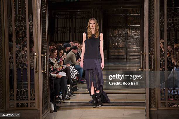 Model walks the runway at the merit award winning James Kelly show during London Fashion Week Fall/Winter 2015/16 at Fashion Scout Venue on February...