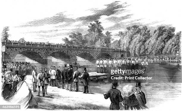 Experiments with Captain Fowke's pontoon bridge on the Serpentine, Hyde Park, London, 1860. Francis Fowke was a British architect and engineer...