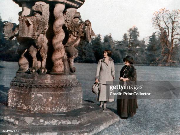 Lady Elizabeth Bowes-Lyon and the Countess of Strathmore, Glamis Castle, Scotland, 1923. Standing beside the sun-dial. A print from The Illustrated...