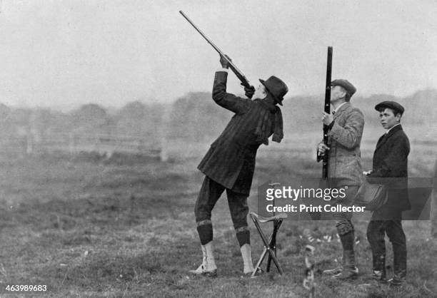 King Manuel II of Portugal shooting at Windsor, Berkshire, 1909. Manuel was visiting King Edward VII. He was the last King of Portugal, coming th the...