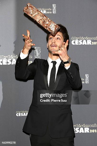 Pierre Niney poses in the Award room after he received the award for Best Actor in 'Yves Saint Laurent' at the 40th Cesar Film Awards 2015 Ceremony...