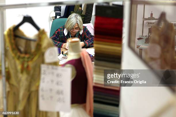 Tailor works at the Tirelli Atelier on February 20, 2015 in Rome, Italy. The costumier Tirelli was established in 1964 and is responsible for the...