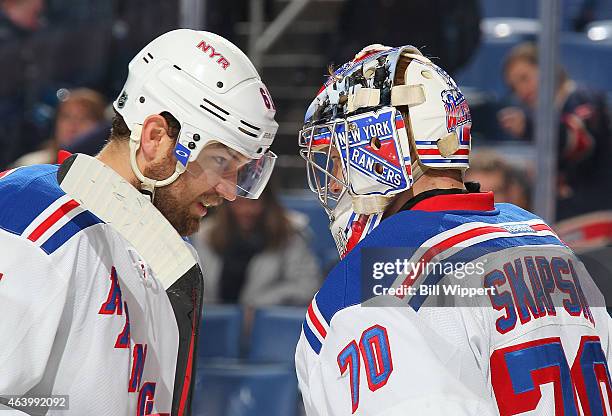 Rick Nash and Mackenzie Skapski of the New York Rangers celebrate their 3-1 win against the Buffalo Sabres on February 20, 2015 at the First Niagara...