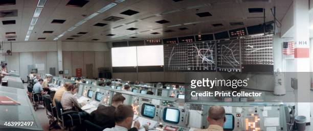 The Mission Operations Control Room in Mission Control Centre, Houston, Texas, USA, 1971. This photograph was taken minutes after the launch of the...