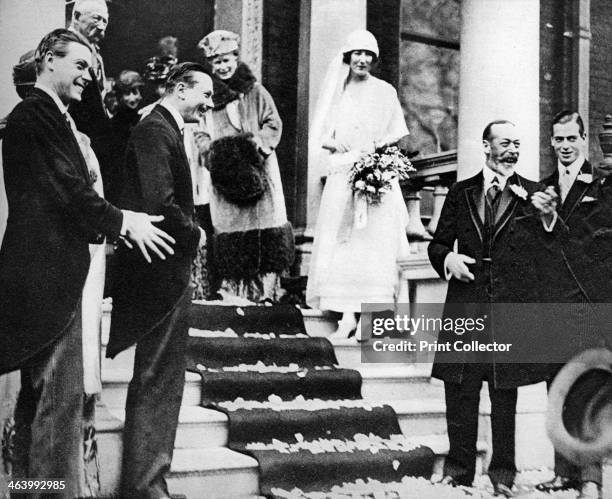 King George V waves good wishes to Princess Maud as she leaves for her honeymoon, 1923. Princess Maud of Fife was a granddaughter of King Edward VII....